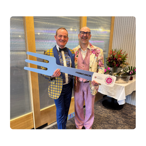 Two men fundraising in fabulous suits