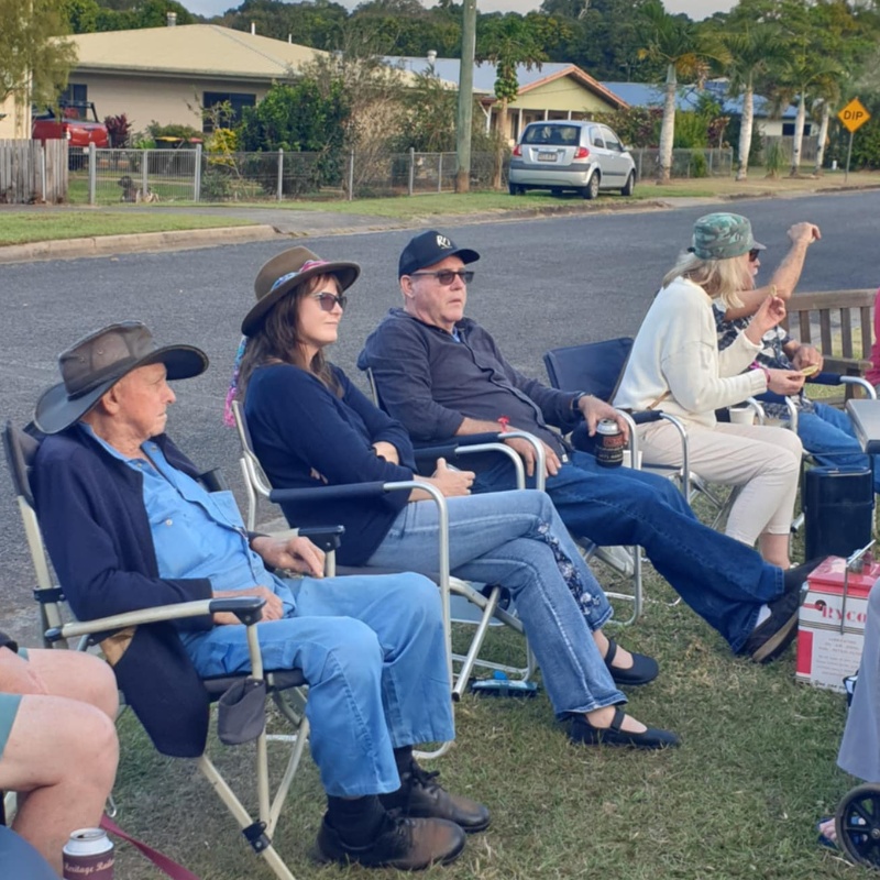 alt='TLT-Host 4 friends on deck chairs sitting'